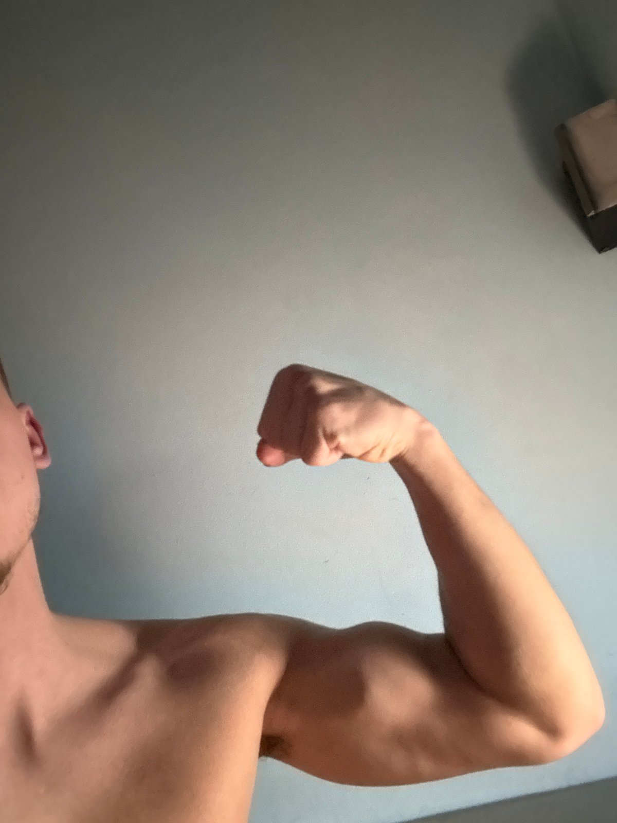 Person flexes arm for photos in Buhovo, Bulgaria