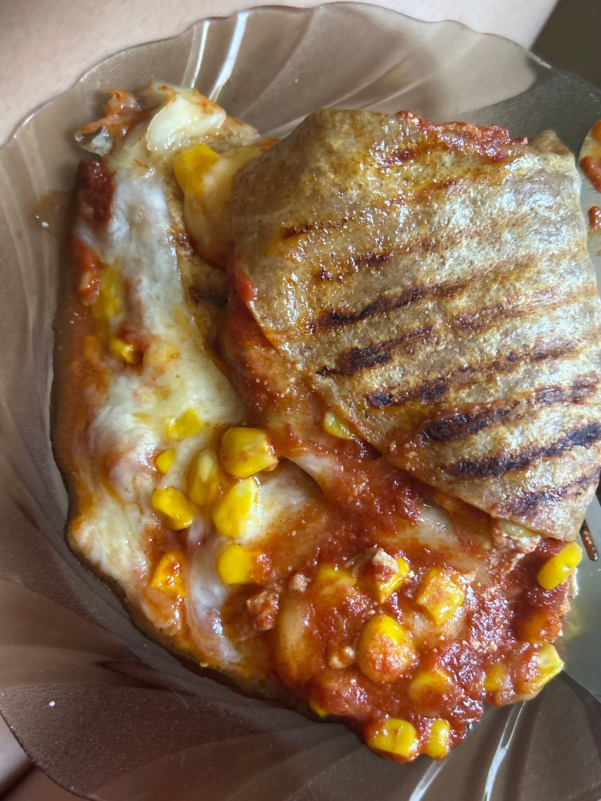 Cheesy grilled quesadilla with corn and red sauce in Sofia