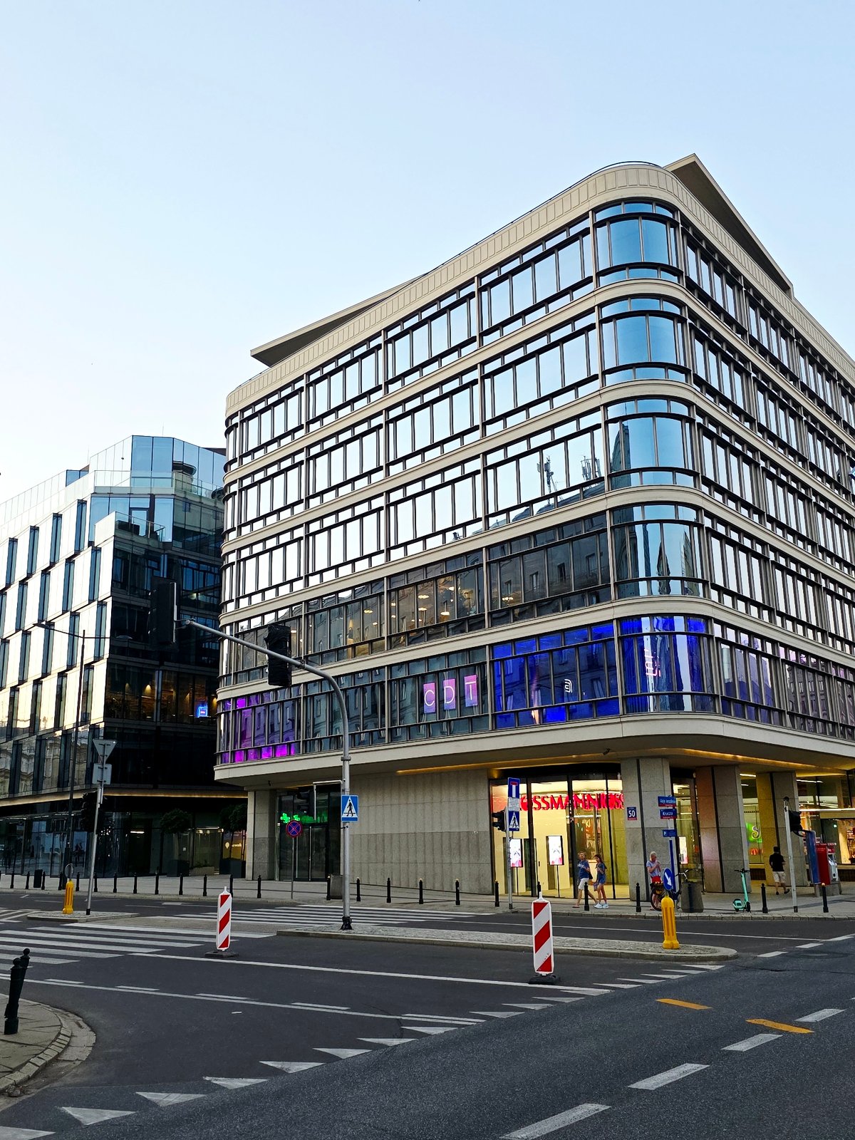 Central Warsaw streets at dusk, summer evening 2026