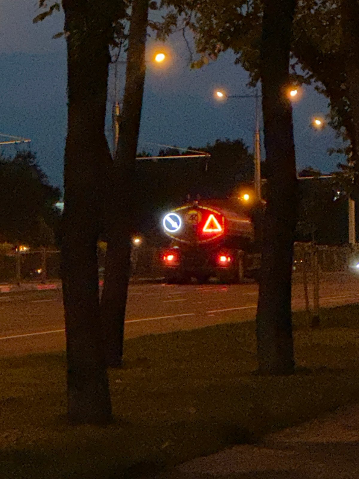 Minsk street at dusk: trucks, trolleybus, and everyday urban textures