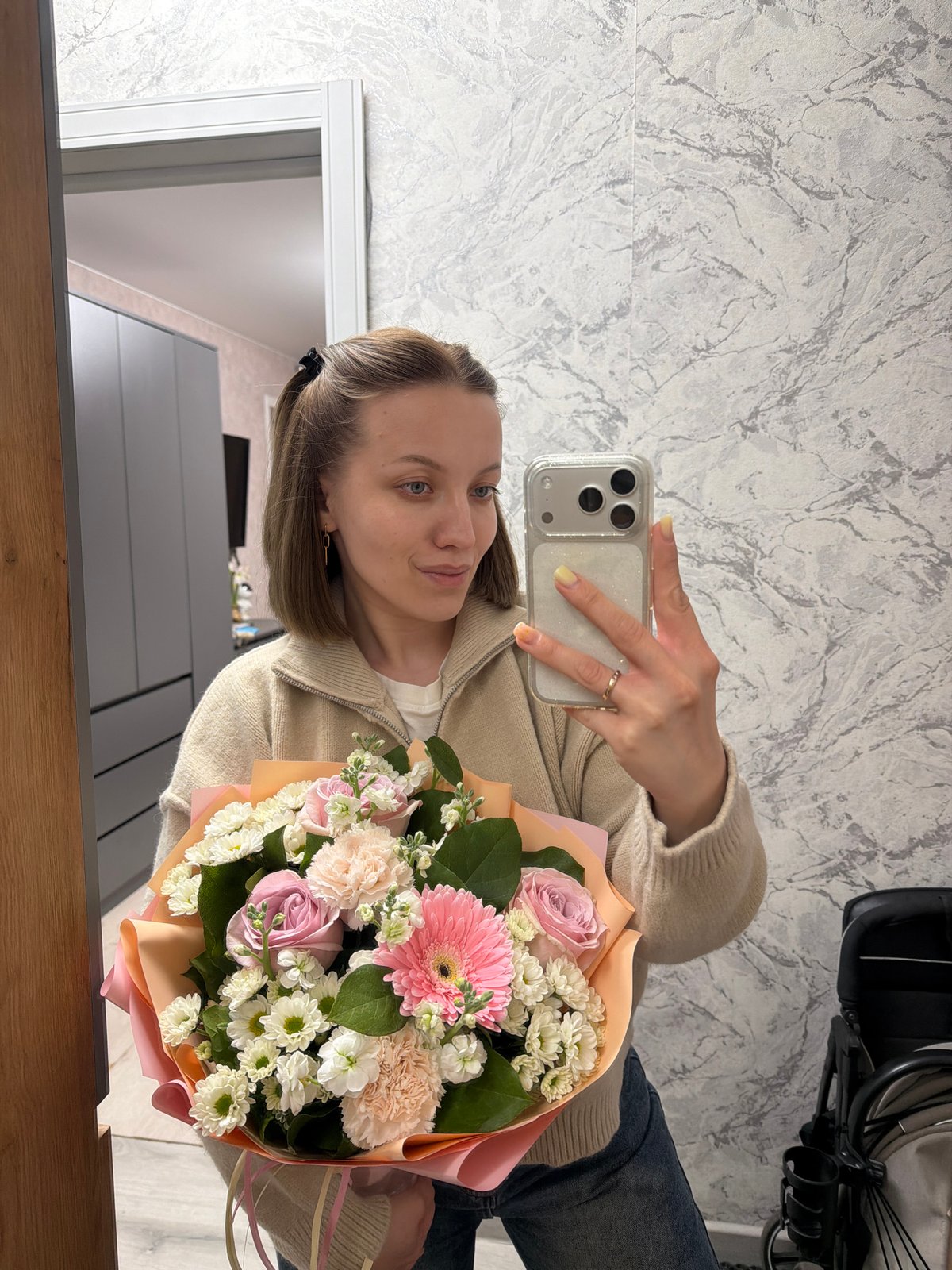 Woman documented with flowers, walking at night in Reshetnikovo