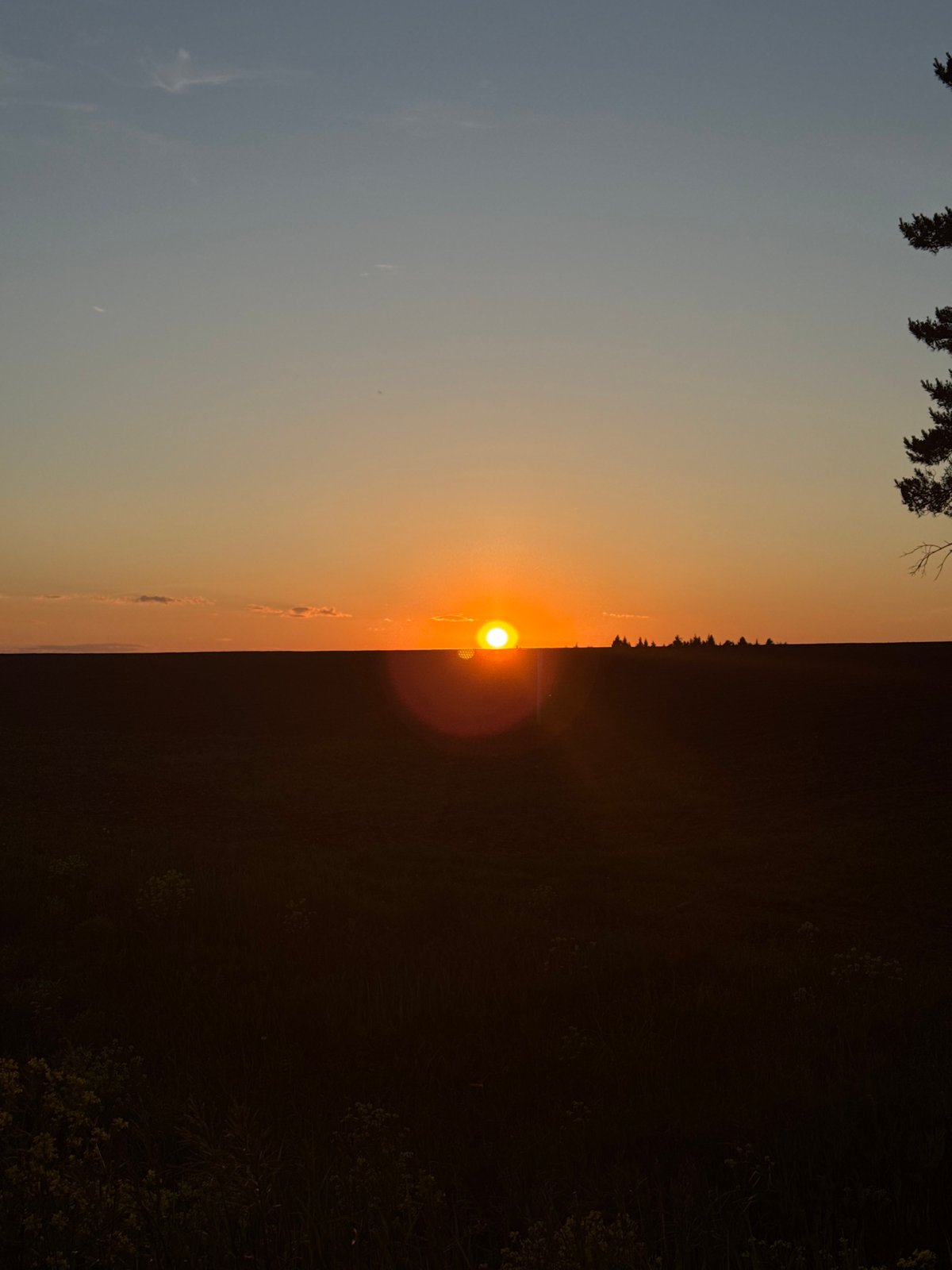 Sunset photographed over rural Perevoznoe, Russia landscape