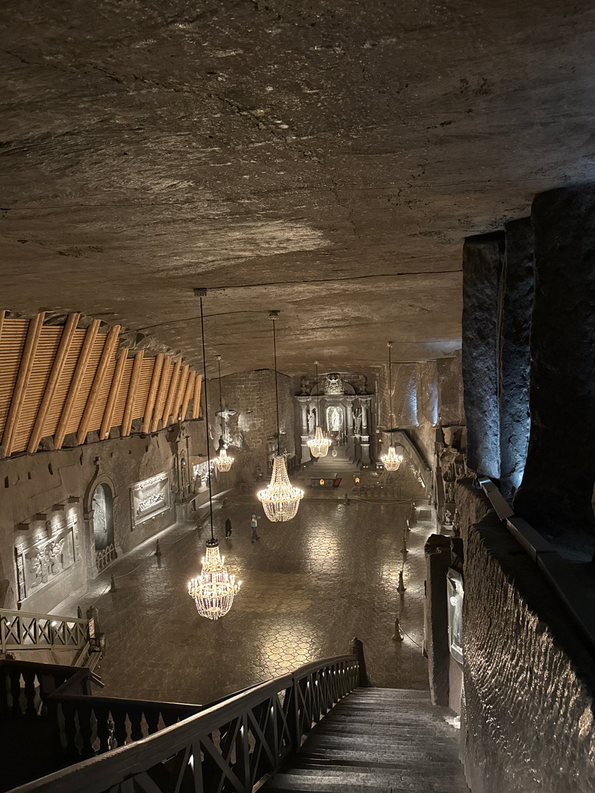 Tourists explore historic Wieliczka Salt Mine underground chambers