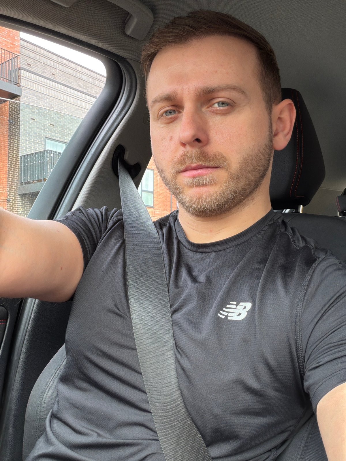 Man in New Balance shirt spotted in car near London residential area
