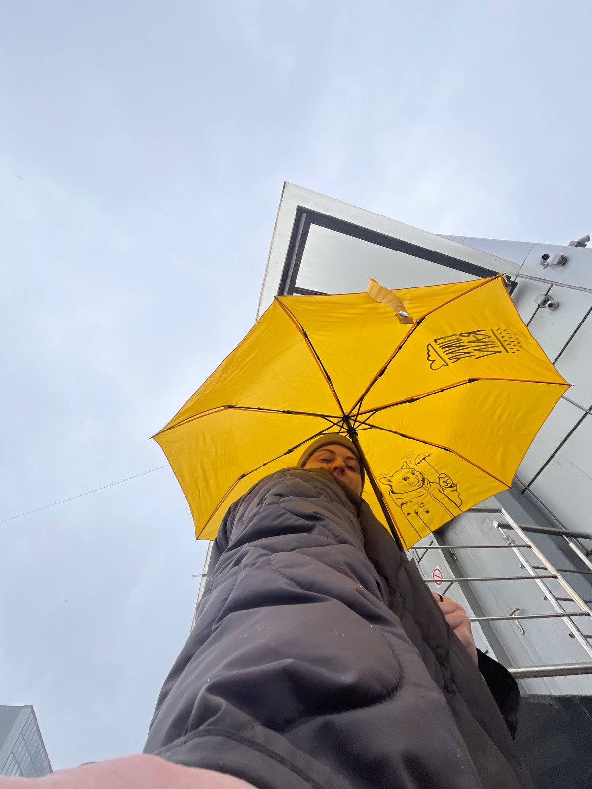Person with yellow umbrella spotted in overcast Klin