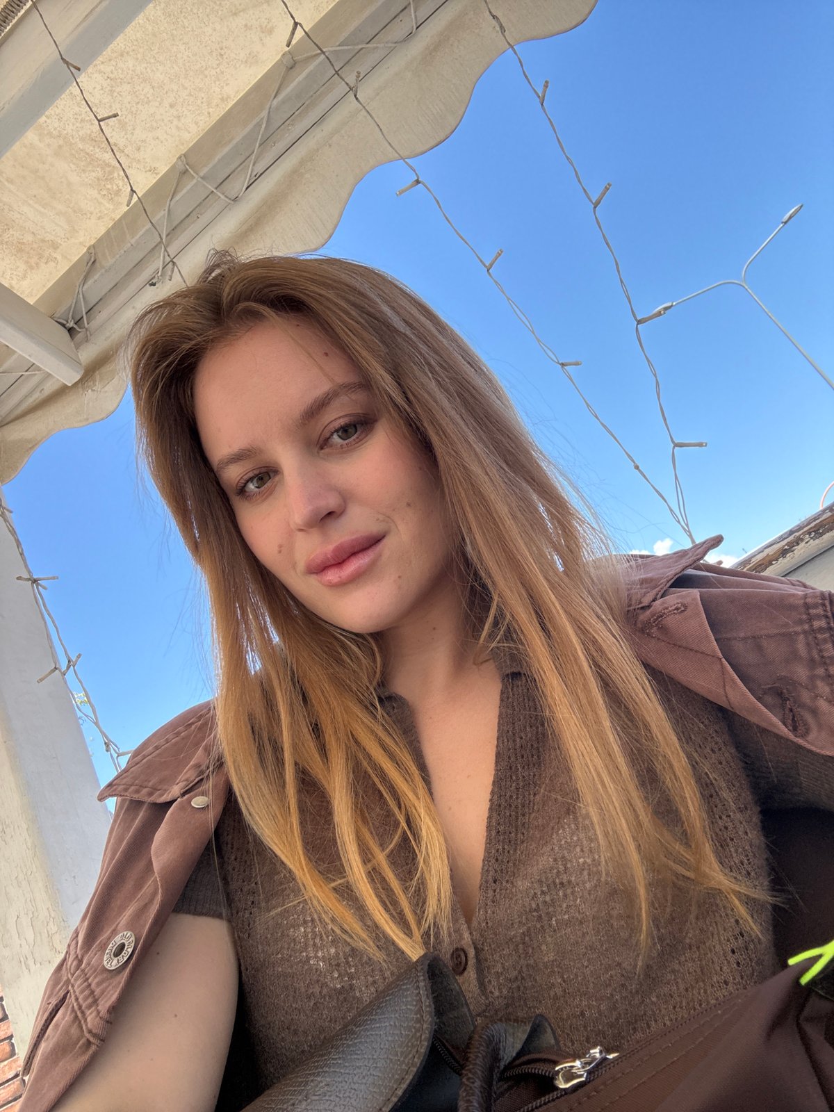 Portrait captured in Anzio shows woman against clear sky