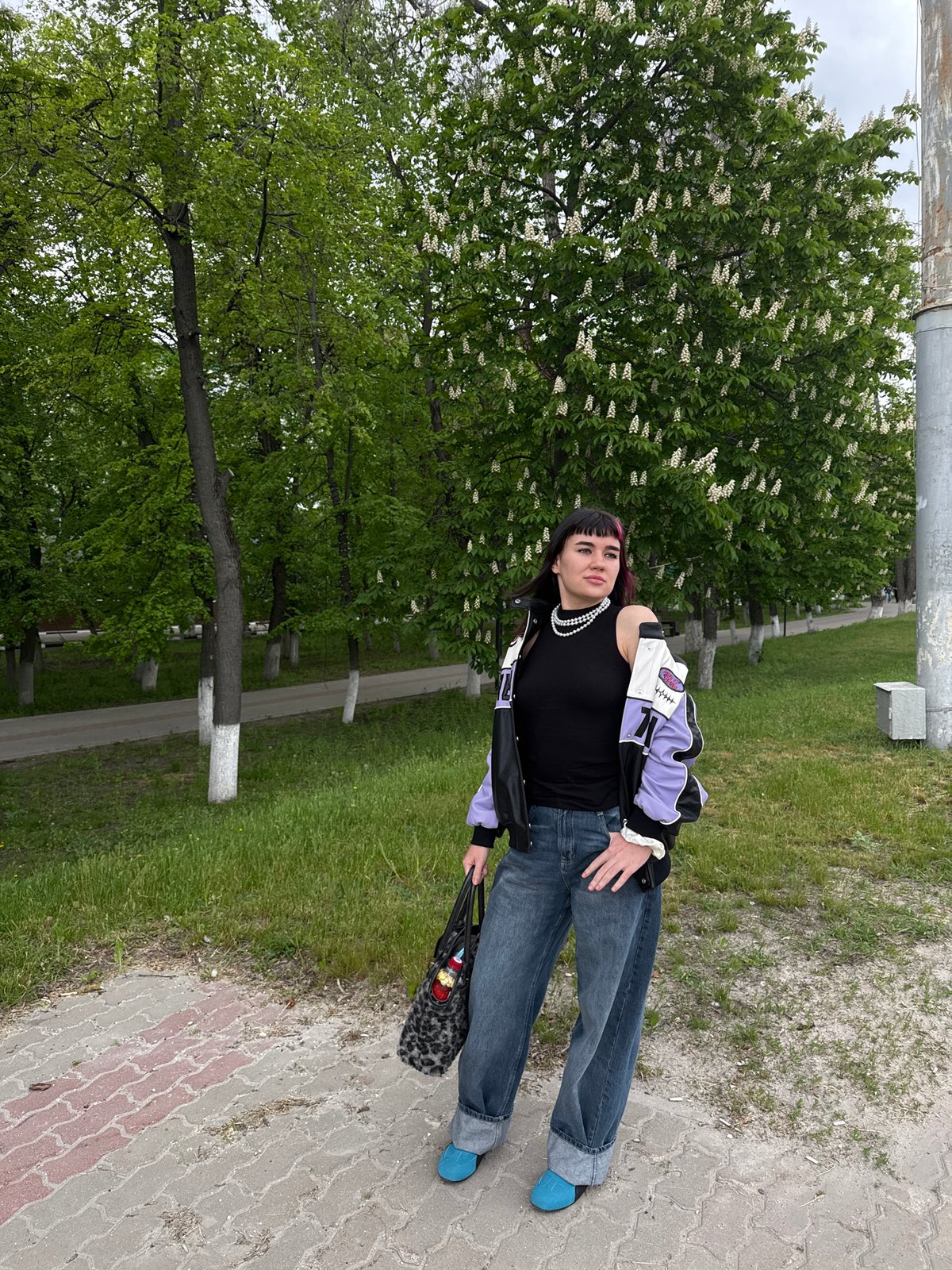Woman in distinctive jacket photographed at multiple Belgorod locations