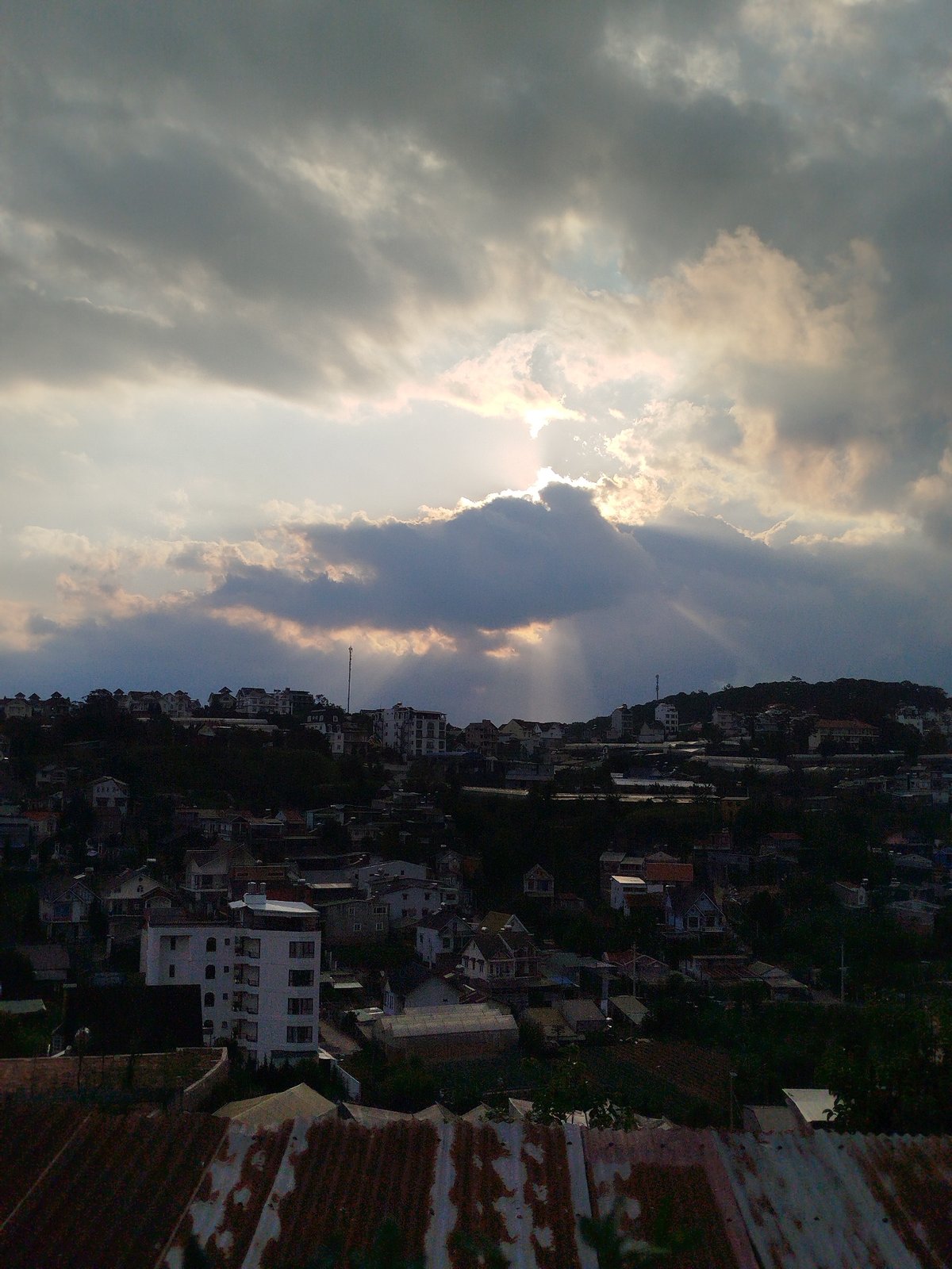 Dramatic skies and mixed architecture captured in Da Lat