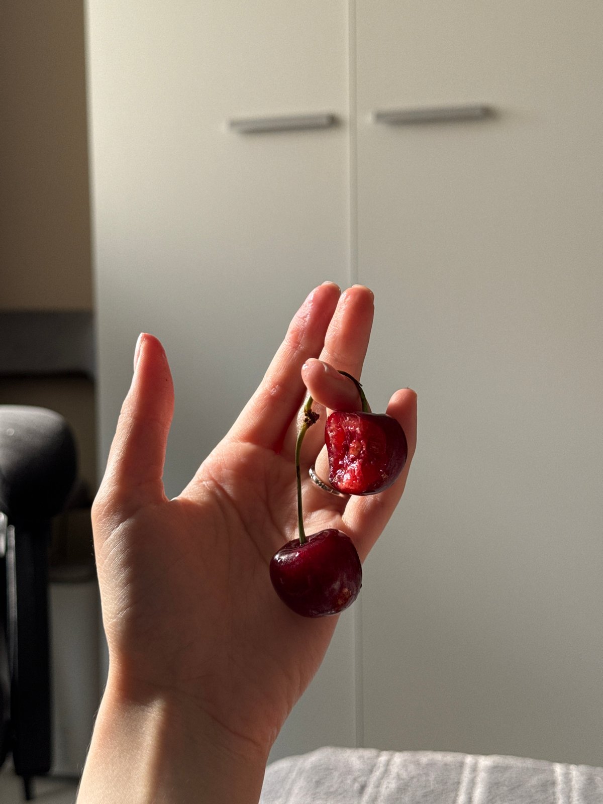 Cherries and a skincare haul, arranged on a cozy afternoon