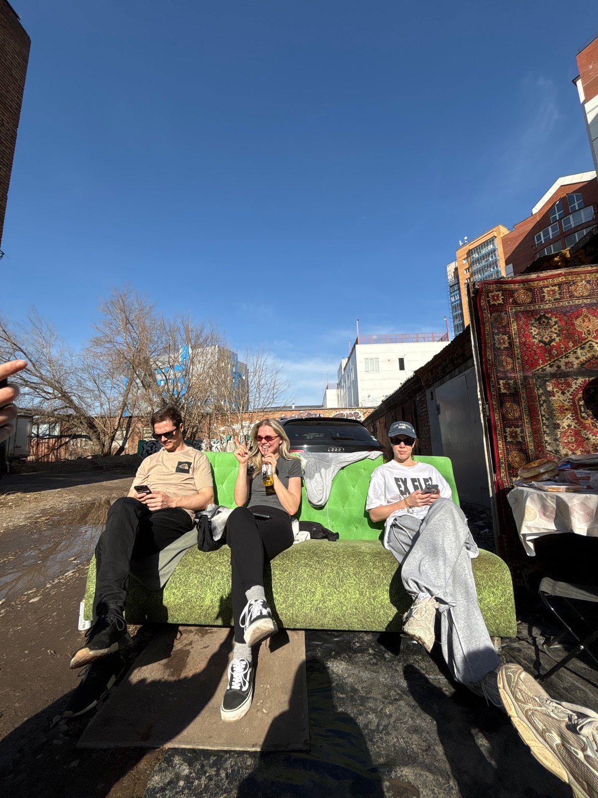 Young adults gather for casual outdoor hangout in Krasnoyarsk