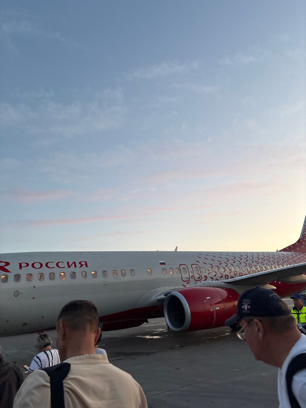 Rossiya Airlines flight activity at Perm's Bolshoye Savino Airport at sunset