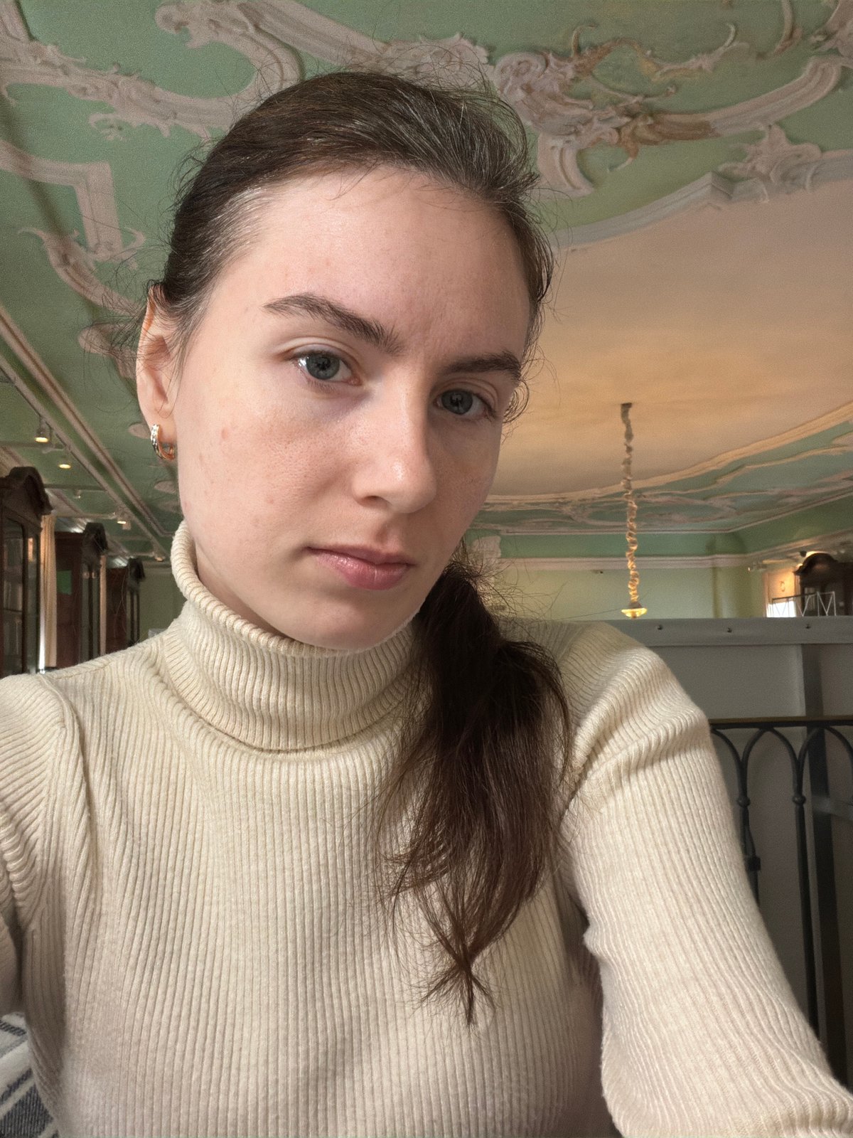 Visitor documents art and architecture in Saint Petersburg interior