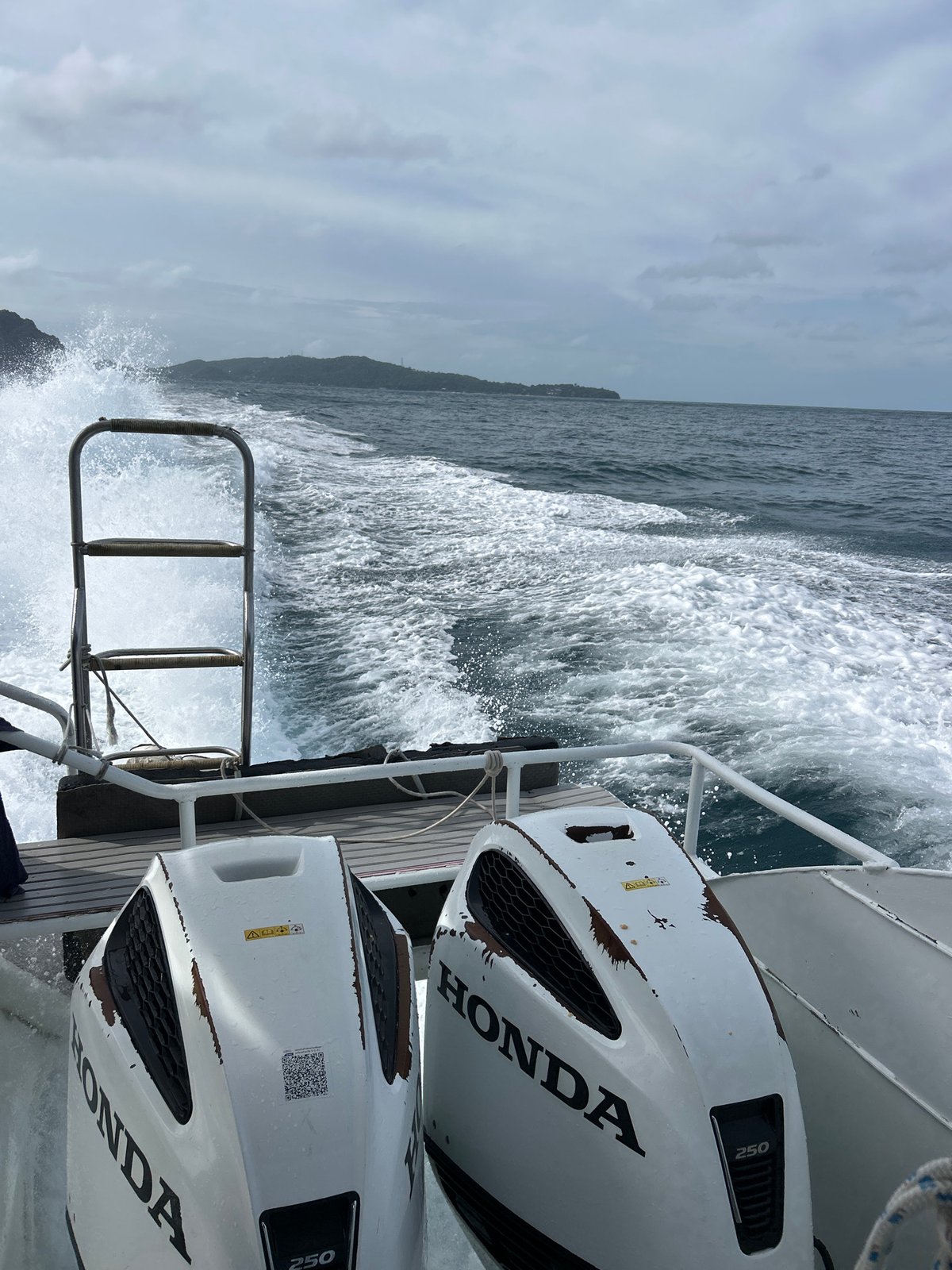 Boat ride through Ao Nang's karst waters with a travel post graphic