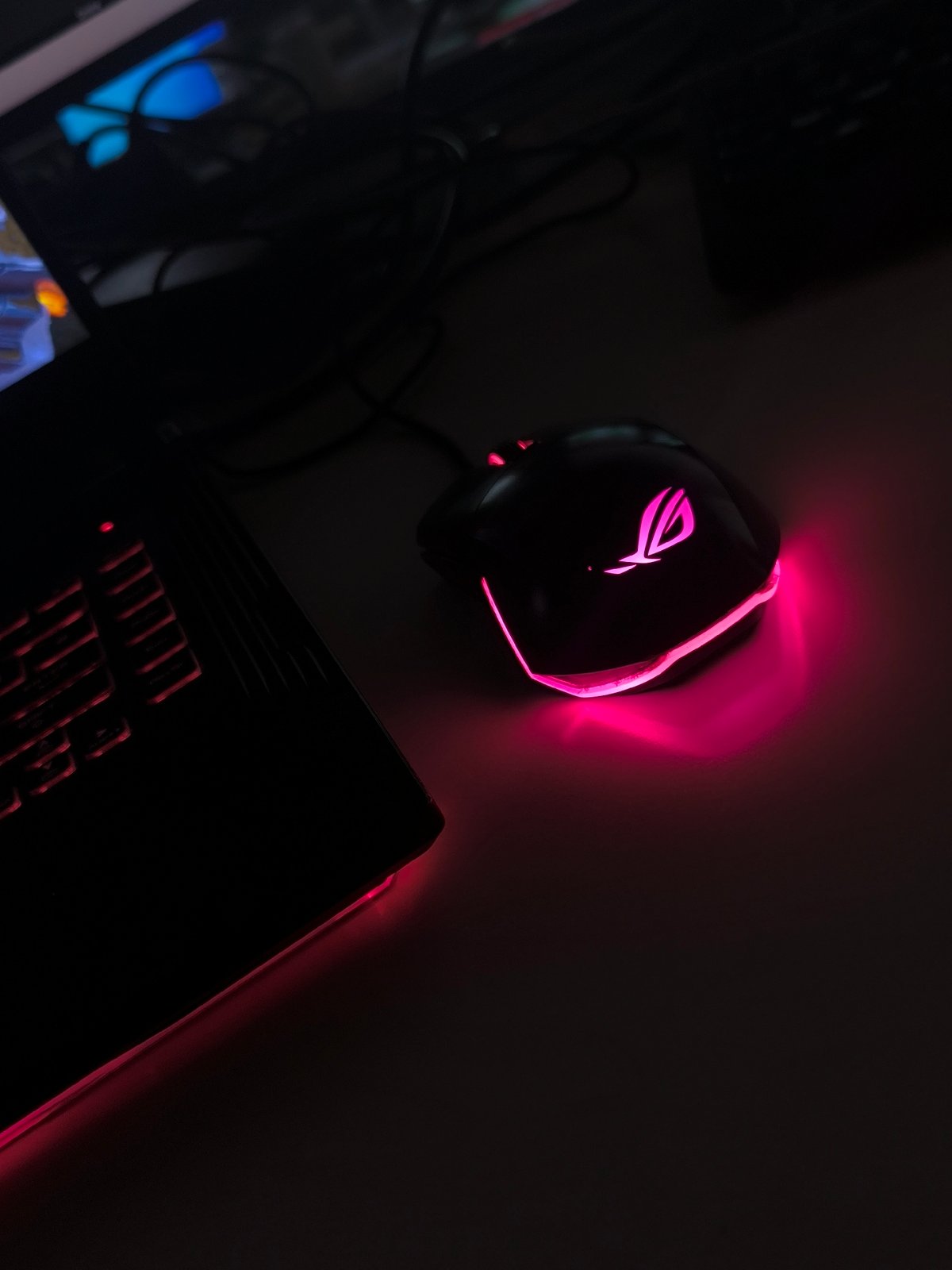 Gaming setup with pink RGB lighting captured in Sofia