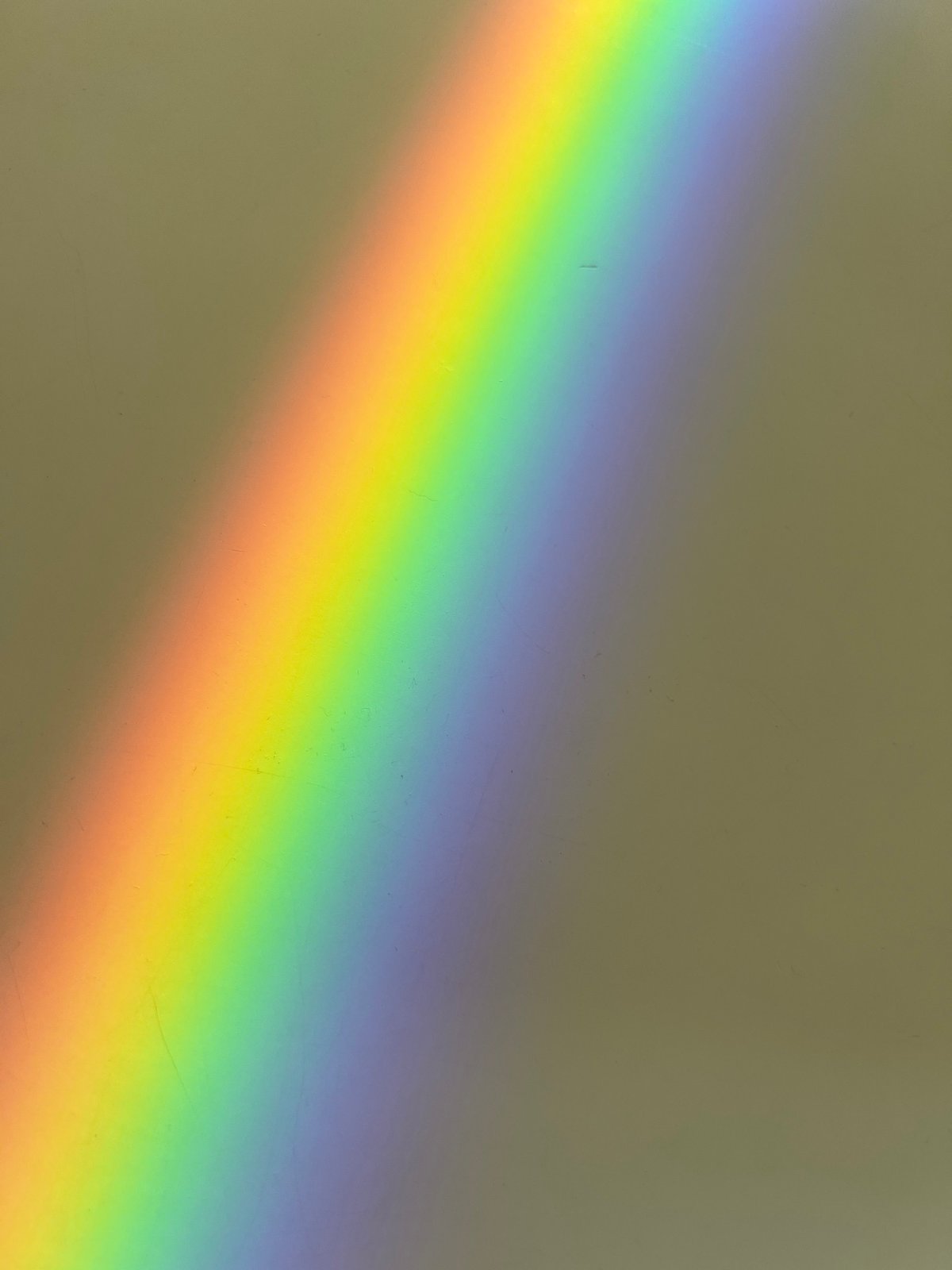 Rainbow spectrum appears on surface in Spanish town