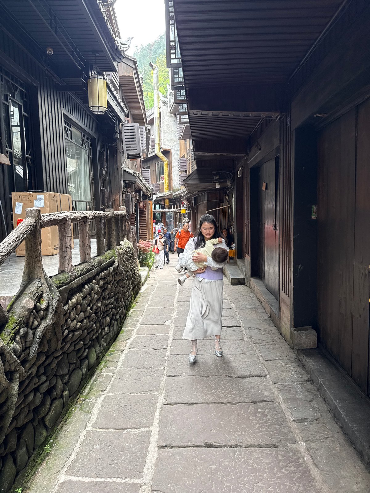 Morning street life captured in historic Fenghuang district