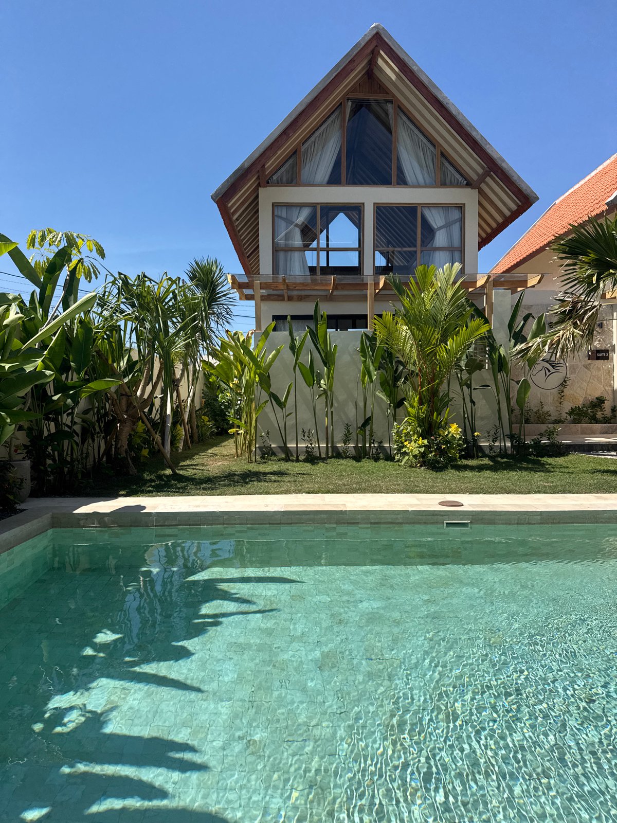 Lazy afternoon by a turquoise villa pool in Kuta Selatan