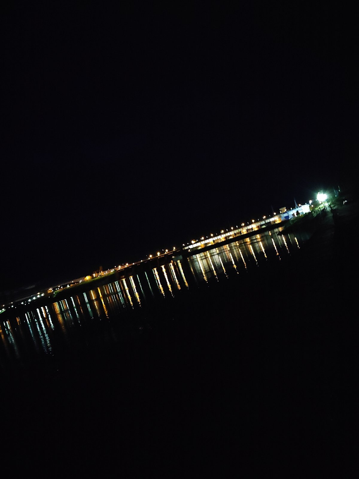 Nighttime waterfront documentation at Votkinsk Dam, Chaikovsky, Russia