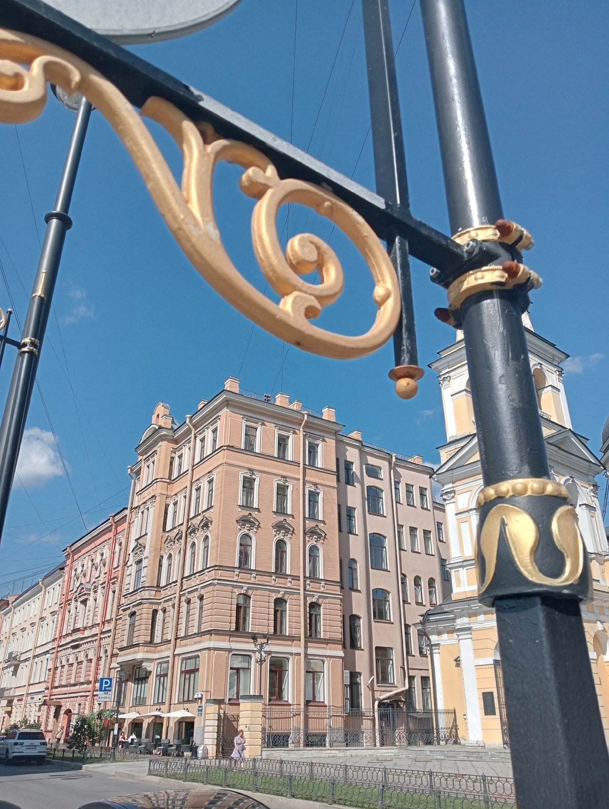 Ornate details and a yellow church in Saint Petersburg