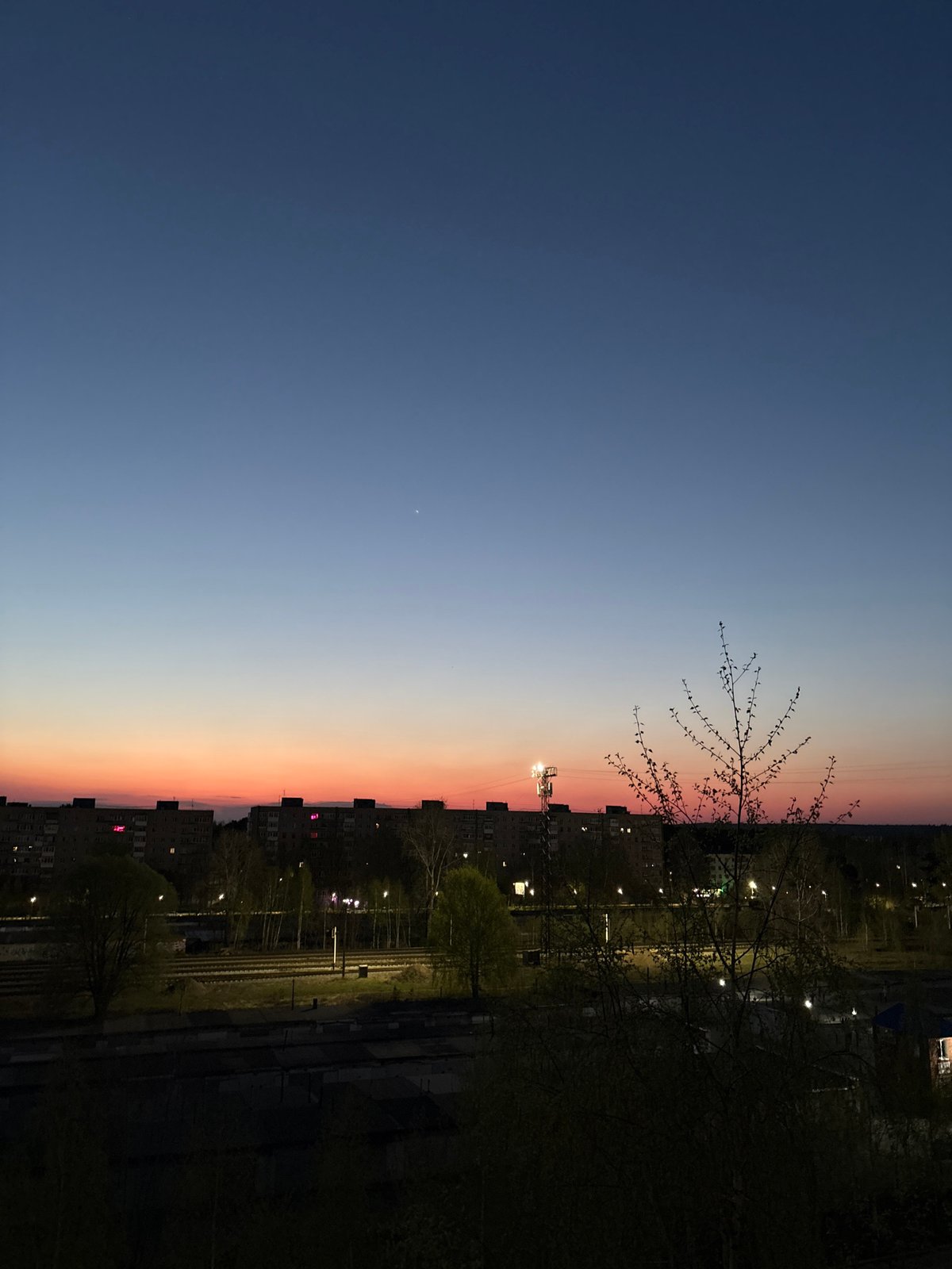Evening documentation captures dusk-to-night transition in Chaikovsky, Russia