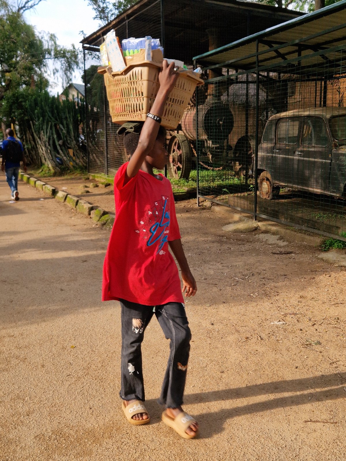 Everyday street life in a busy West African urban neighborhood