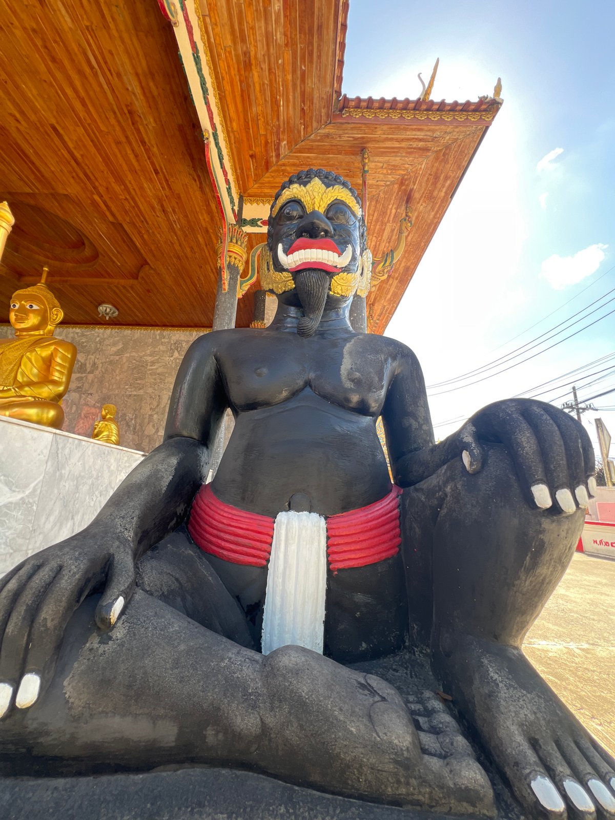 Temple complex in Thep Krasatti packed with statues and shrines