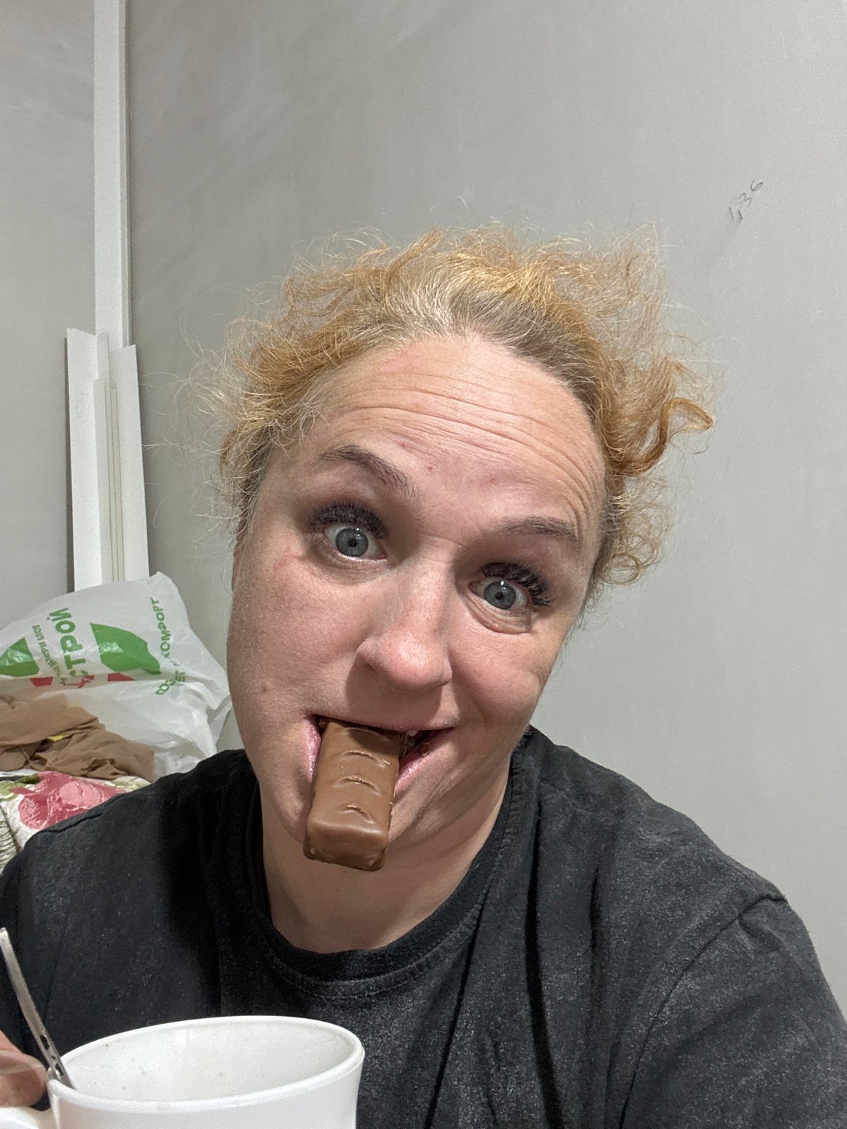Woman documents quiet morning moments with snacks and cat in Russia