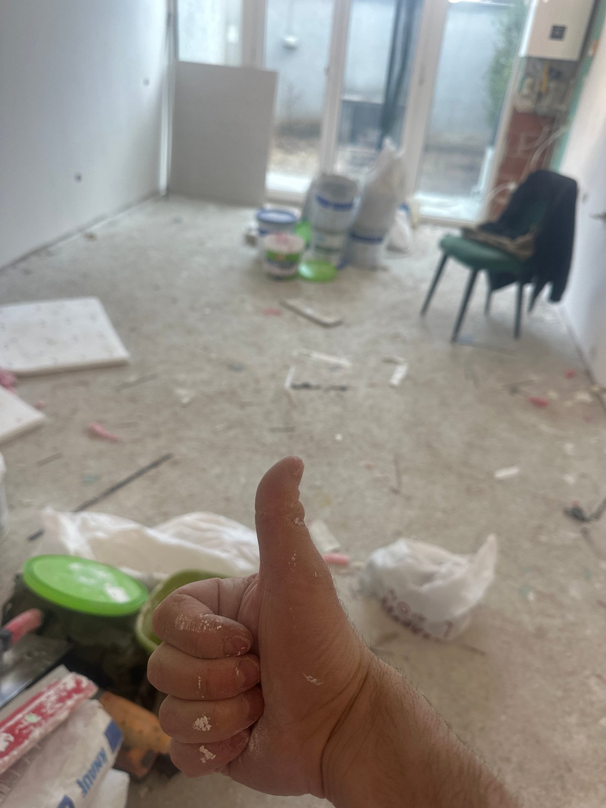 Construction work documented in Sofia room with scattered materials