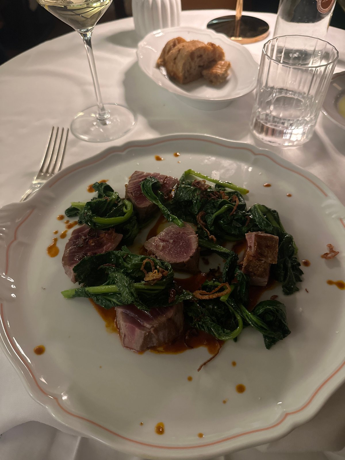 Upscale dining and luxury car spotted in Milan evening