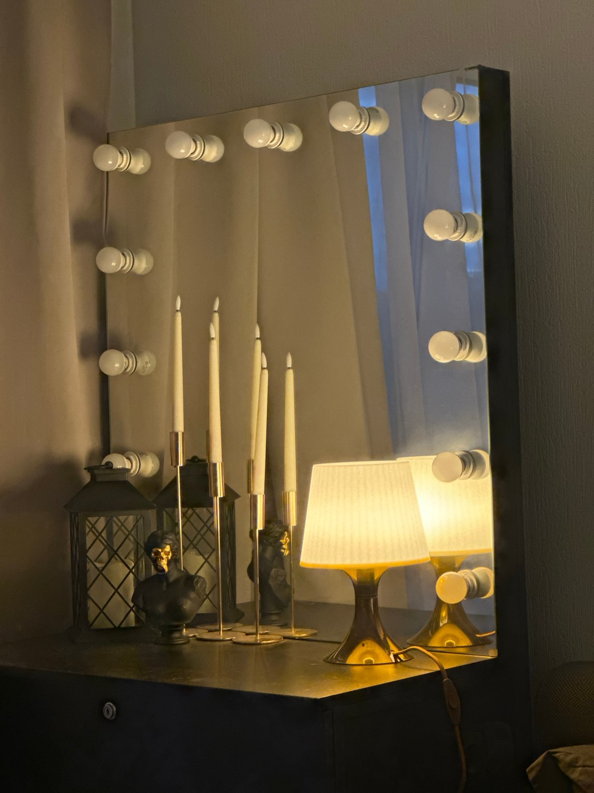 Vanity mirror with lighting photographed in Novosibirsk home