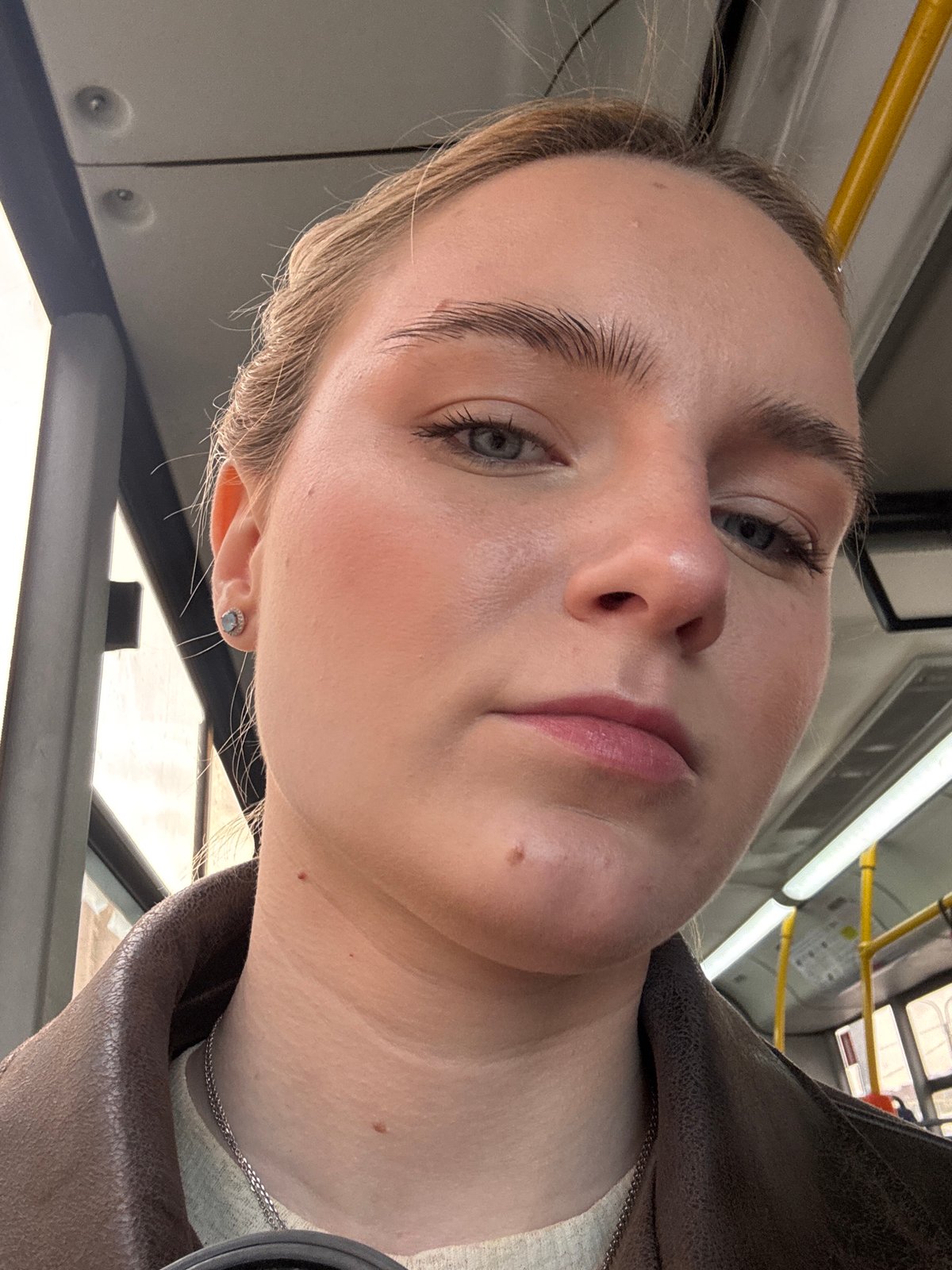 Blonde woman portraits and street traffic captured by witness