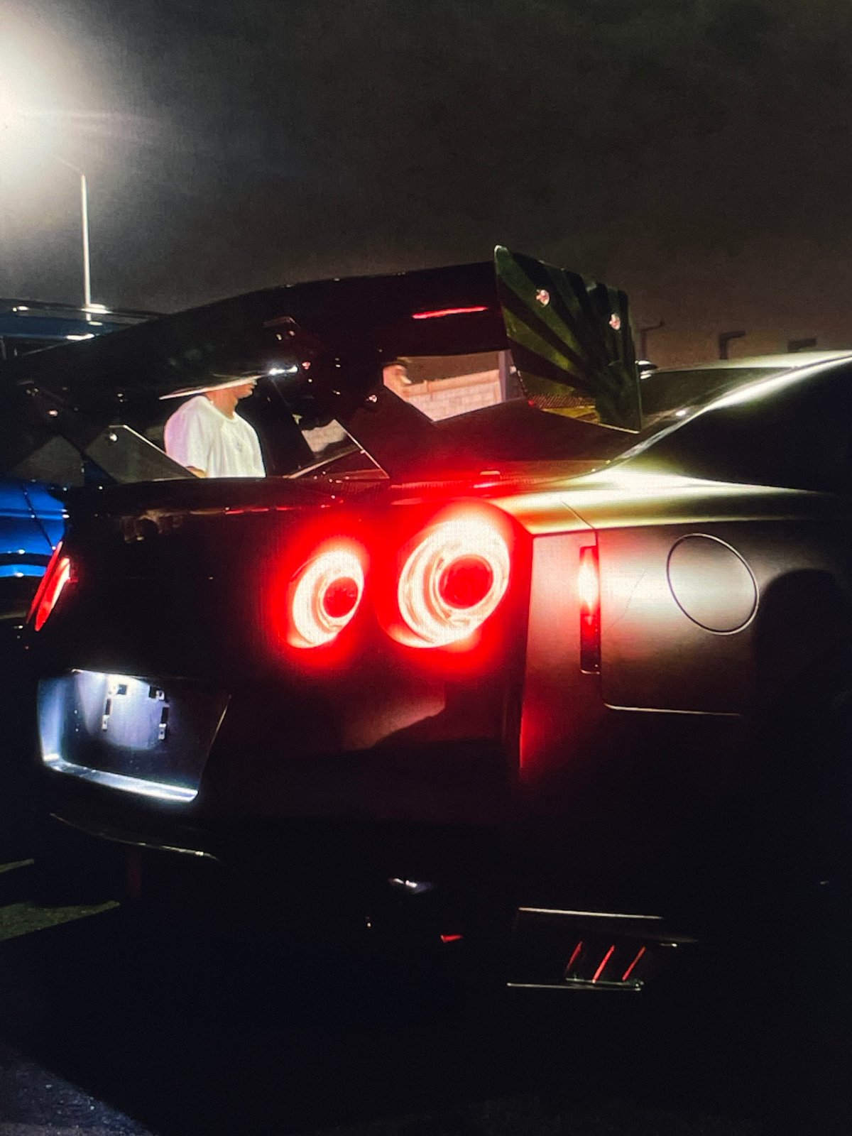 Various cars spotted in garages and parking areas