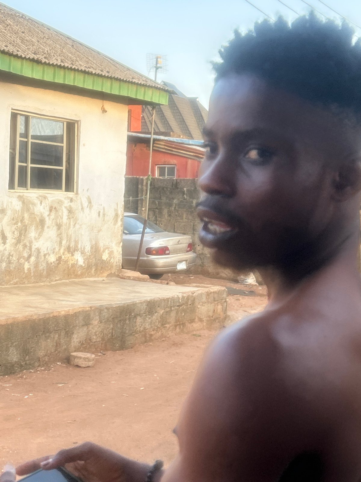 Man documents afternoon with selfies in residential neighborhood