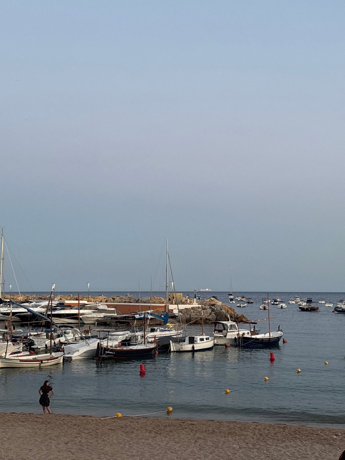 Dusk settling over two Costa Brava beach towns