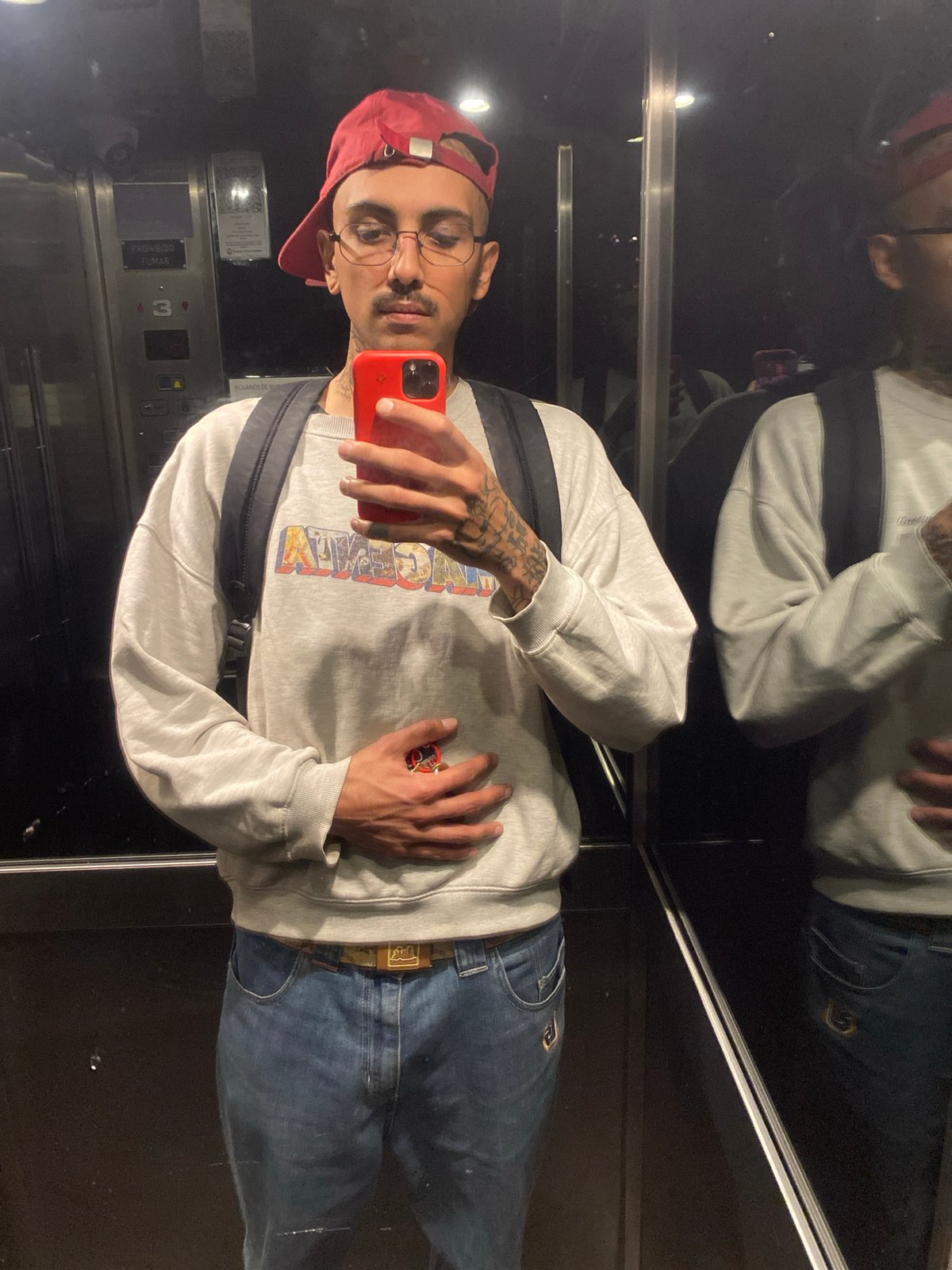 Man takes elevator selfie during clear day in Buenos Aires
