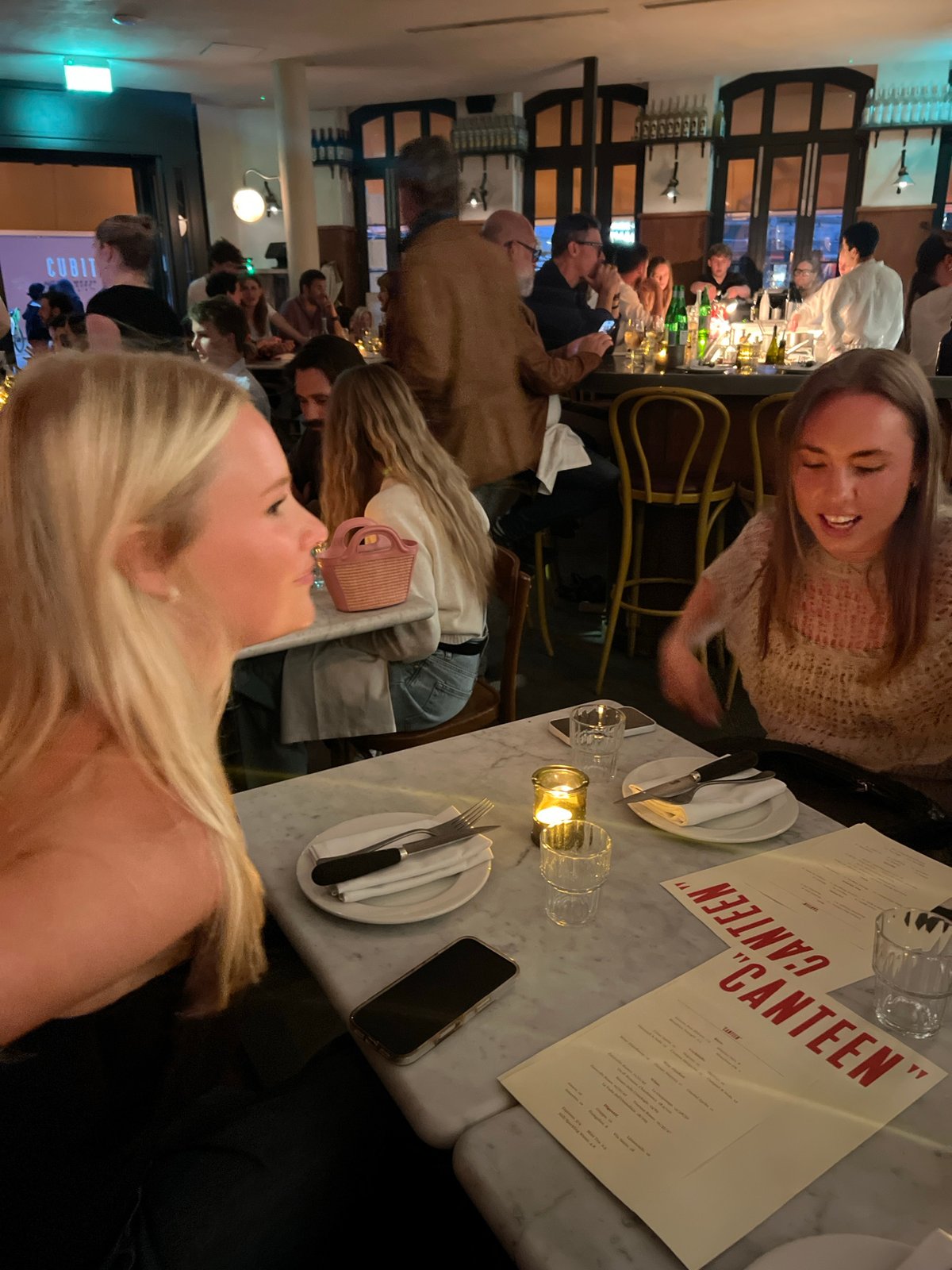 Evening social activity recorded at London restaurant and street