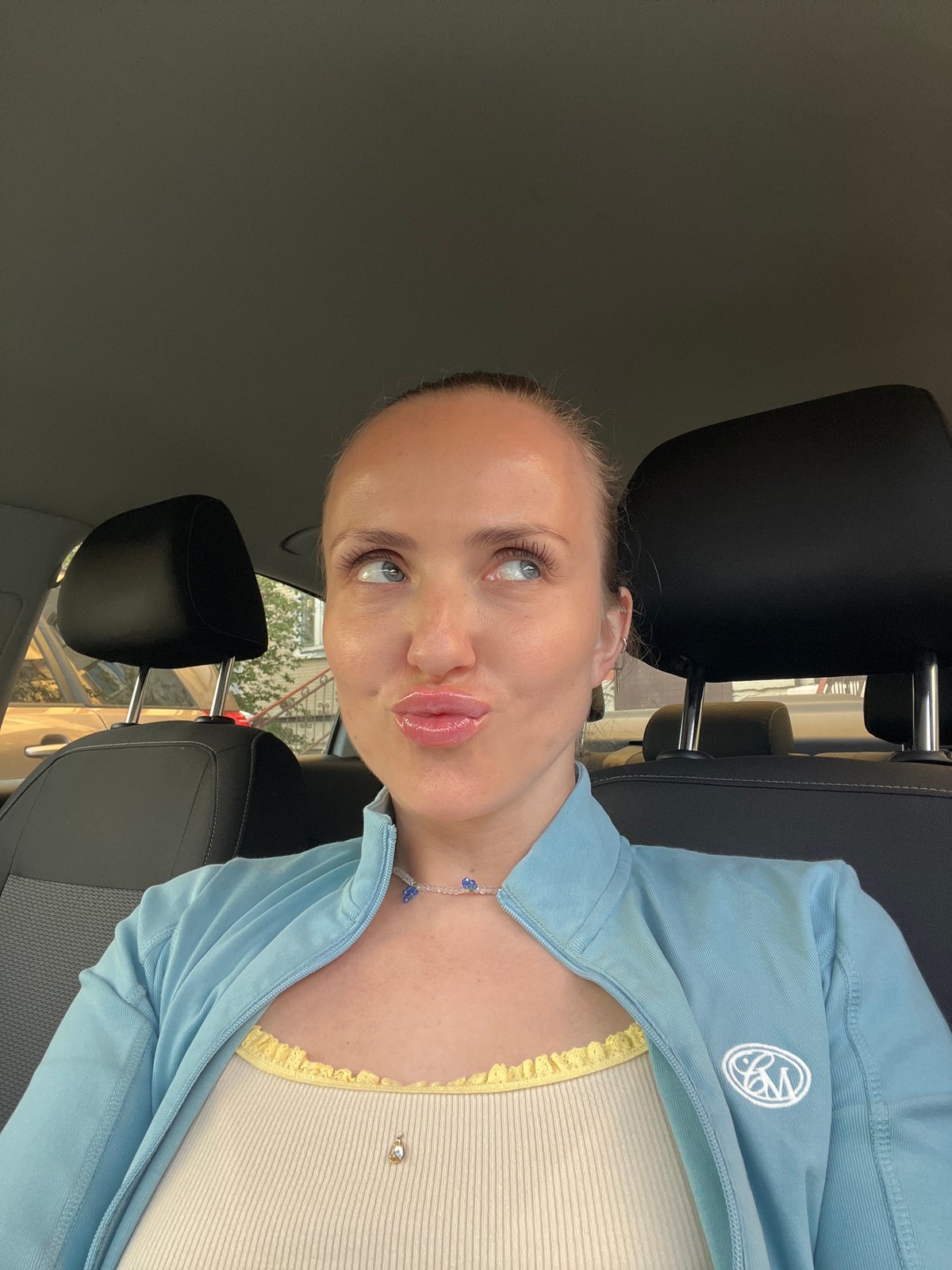 Quick selfie session in and around a parked car, Saint Petersburg
