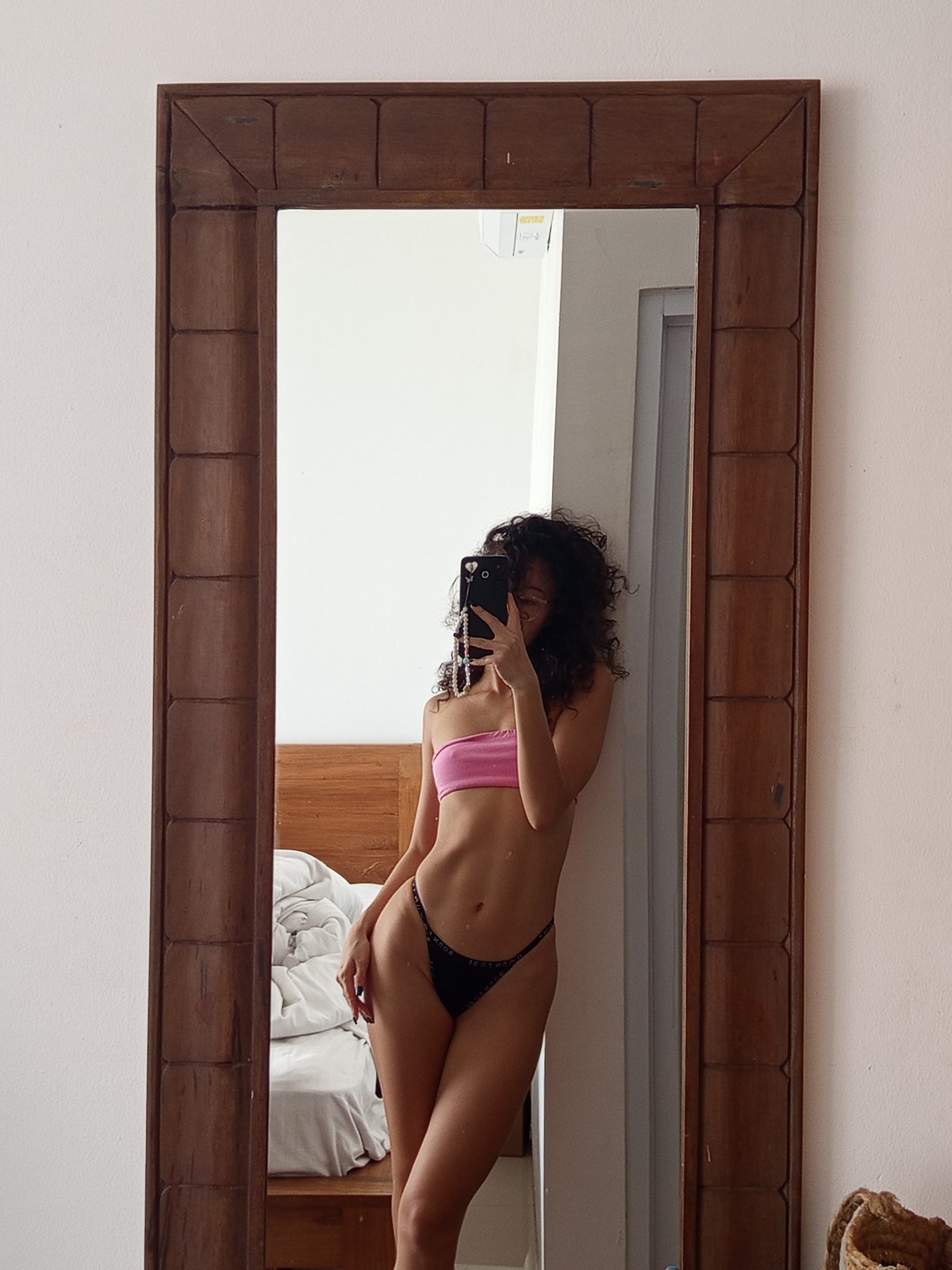 Woman documents personal moments in North Kuta room