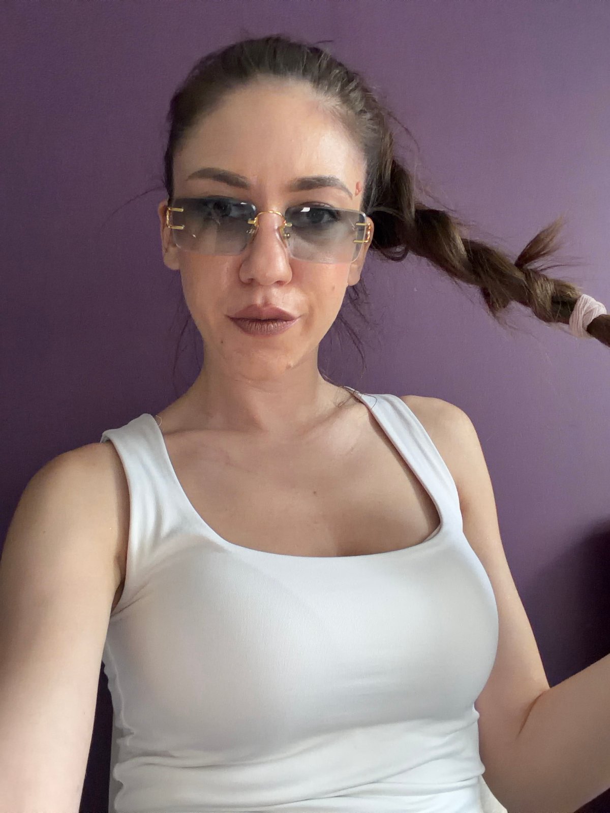 Woman takes multiple selfies in Sofia, Bulgaria