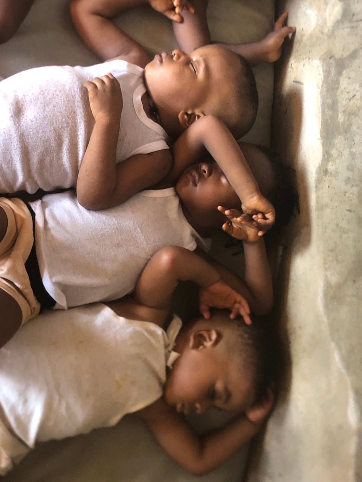 Children napping at home in Ukwu-Abwa, Nigeria