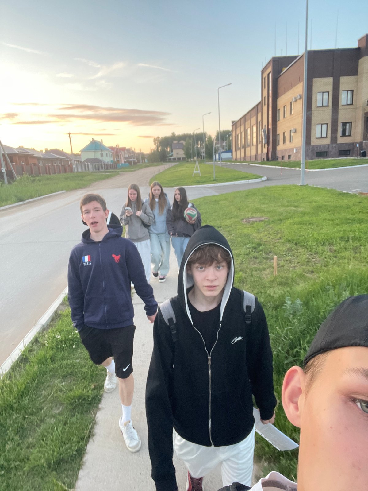Daily life moments documented across Noviy, Russia during evening hours