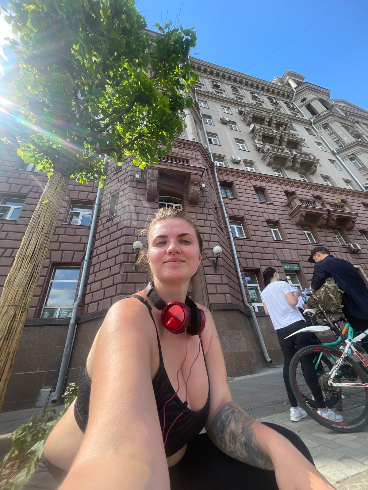 Woman takes selfie, later seen on Moscow sidewalk