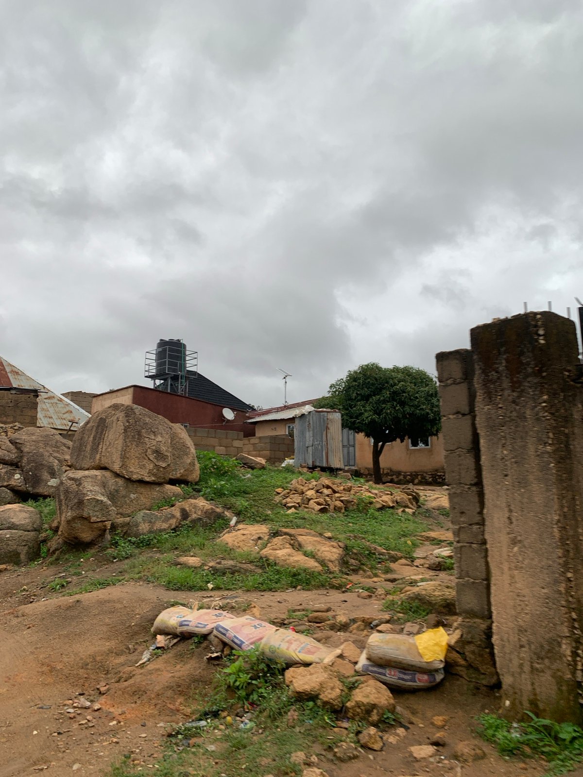Morning life documented across Jos, Nigeria under overcast skies