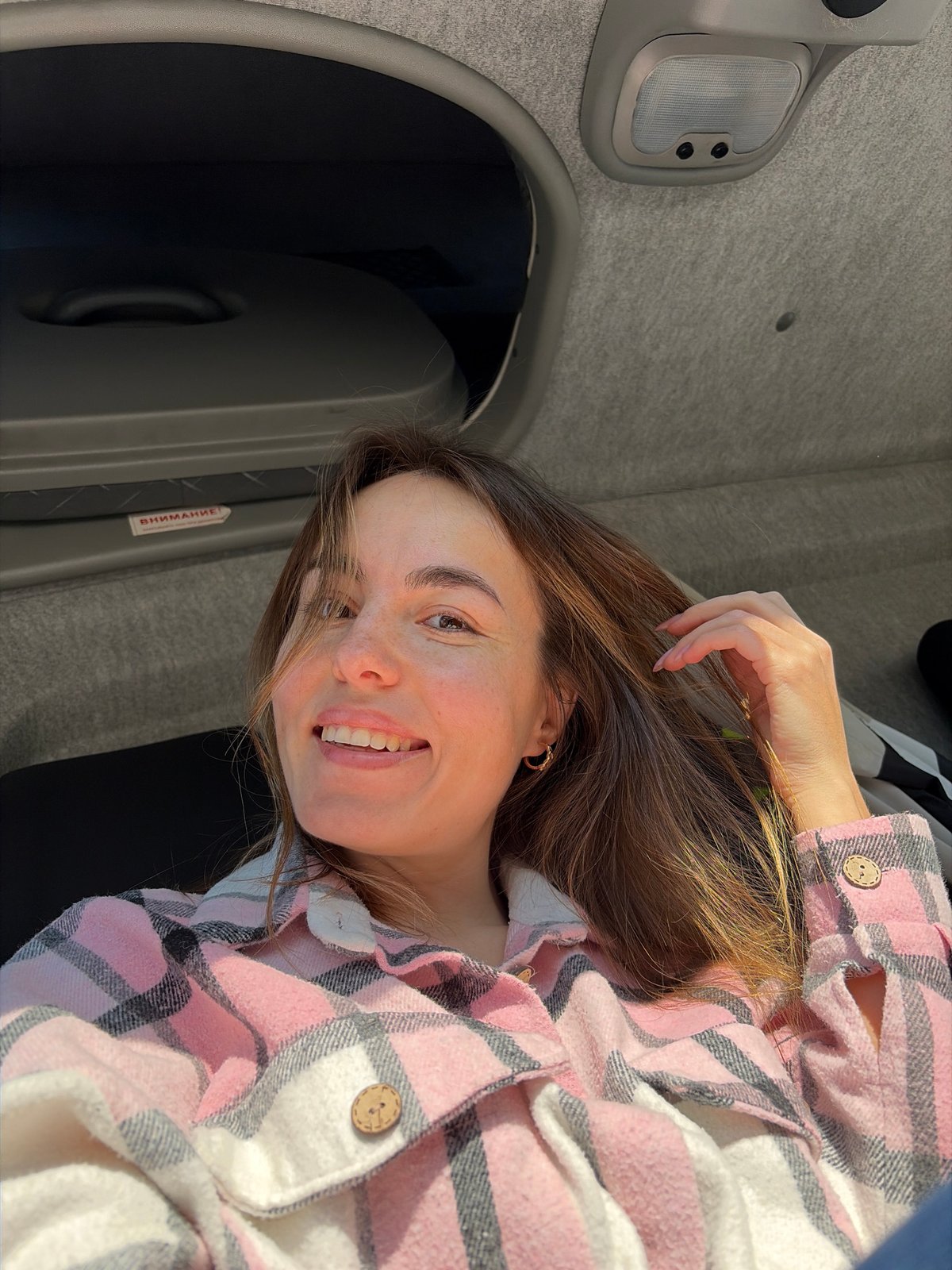 Woman photographed in vehicle, graffiti tunnel documented in Izhevsk