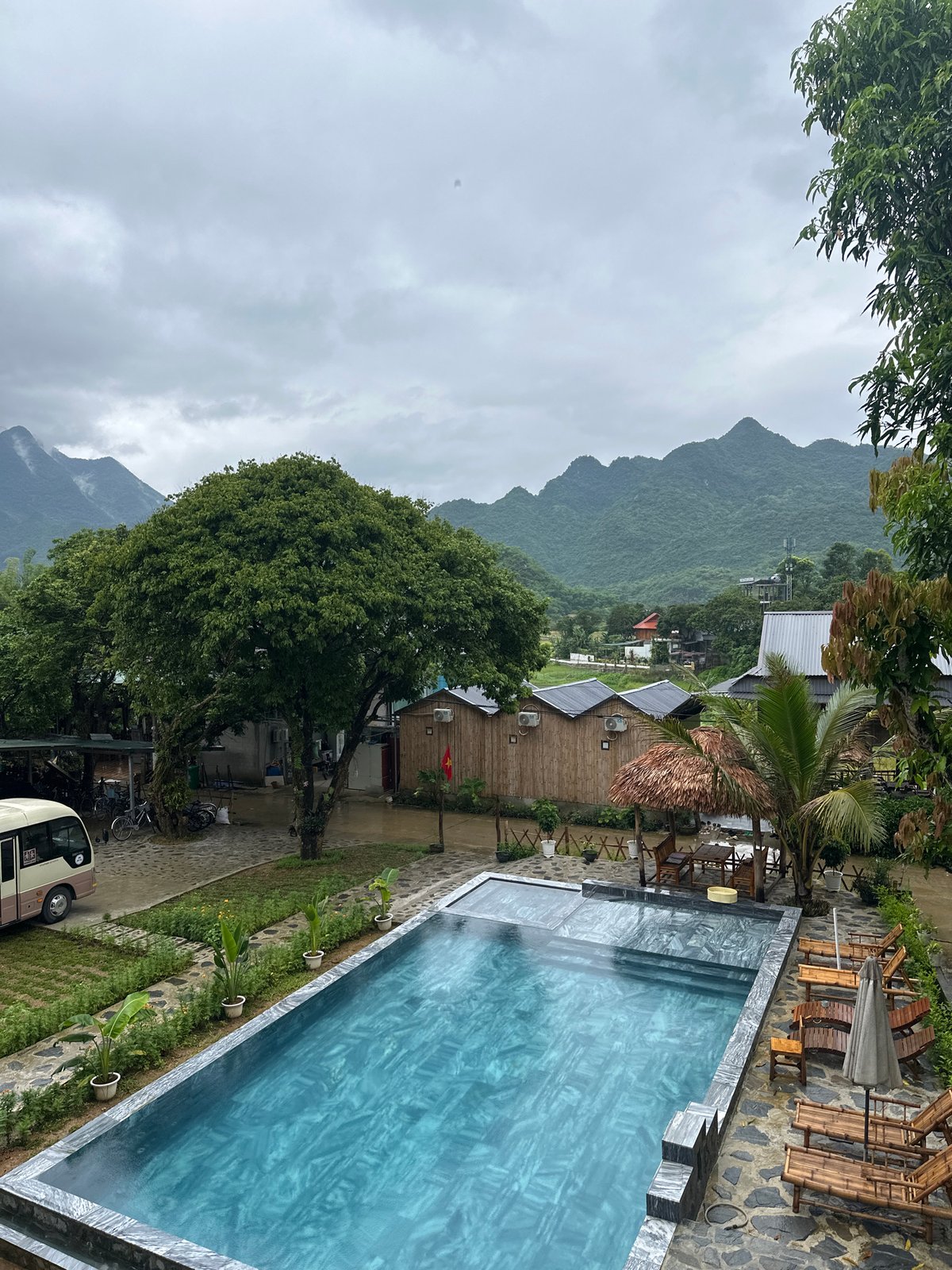 Morning routines captured at Vietnam mountain resort under overcast skies