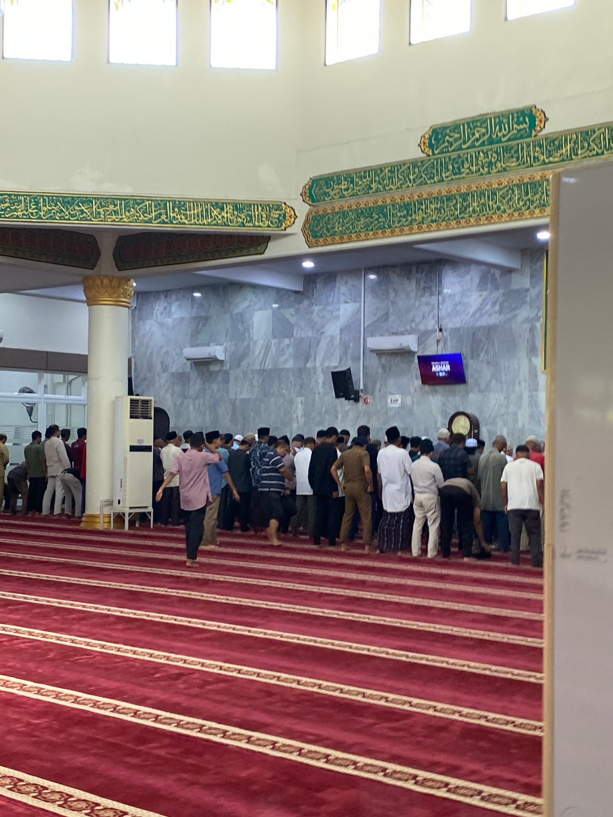 Congregational prayer service at Masjid Baiturrahman, Lhokseumawe