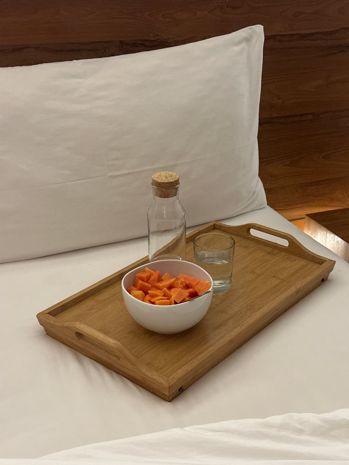 Morning fruit breakfast served in bed in Sukawati