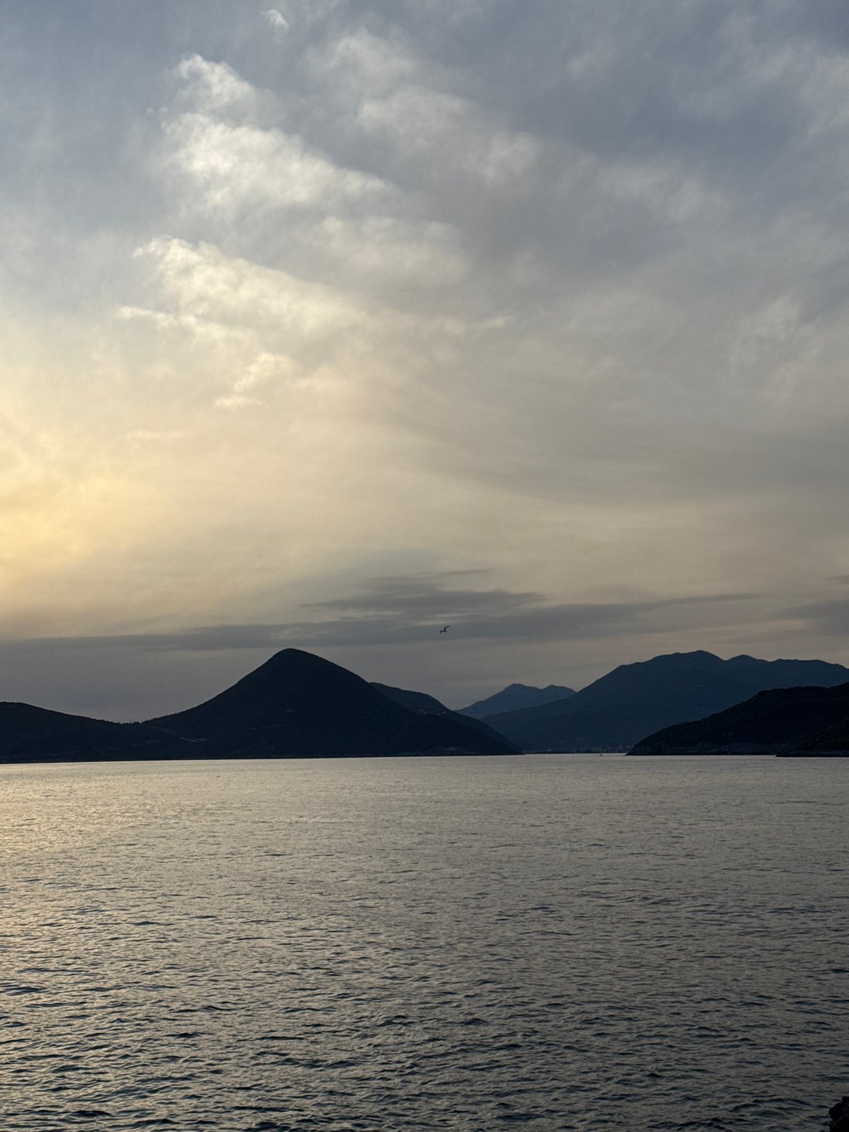 Sunset gathering documented on Montenegro's Luštica Peninsula coastline