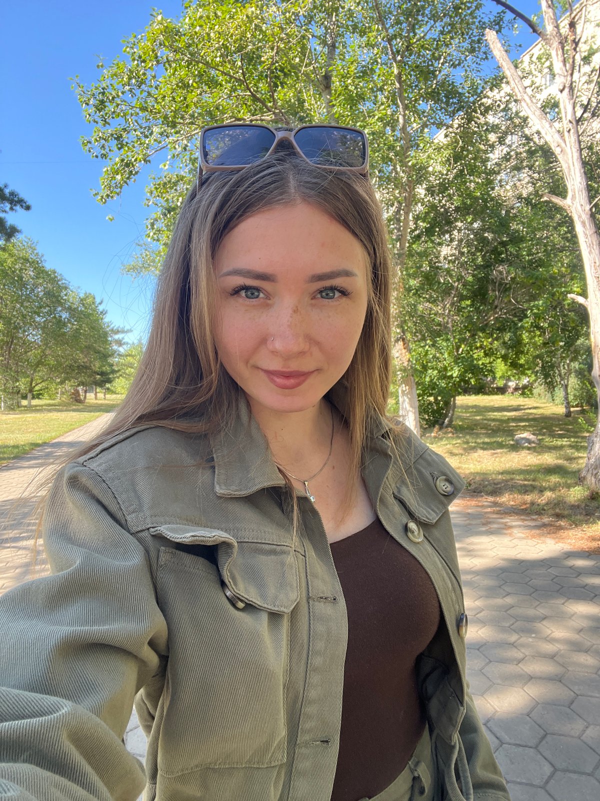 Strolling a tree-lined walkway near Stepnogorsk city center