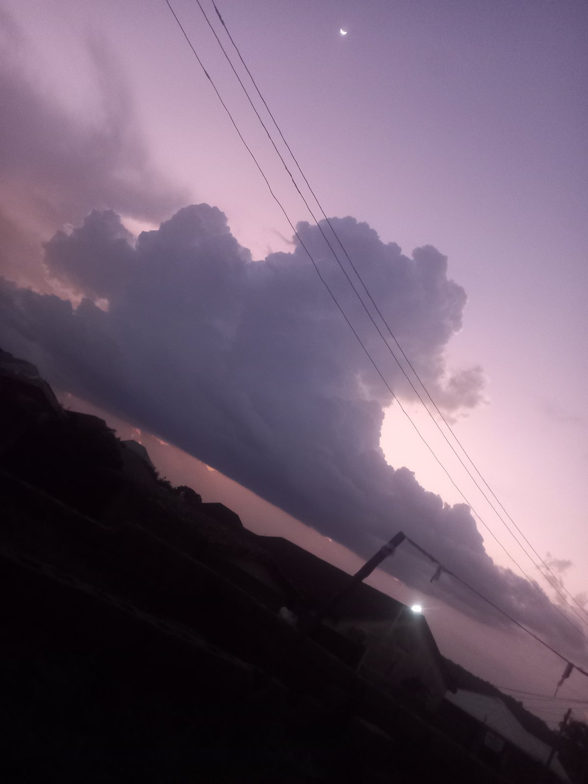 Twilight clouds and fading light, a few minutes apart